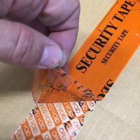RCNT - Precinto seguridad naranja residuo